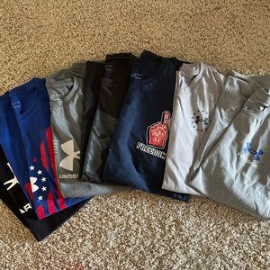 Men’s Medium Under Armour shirts.